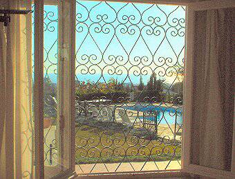 view from the bedroom over Caleta de velez to the sea