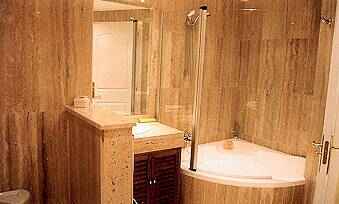 en suite with corner bath